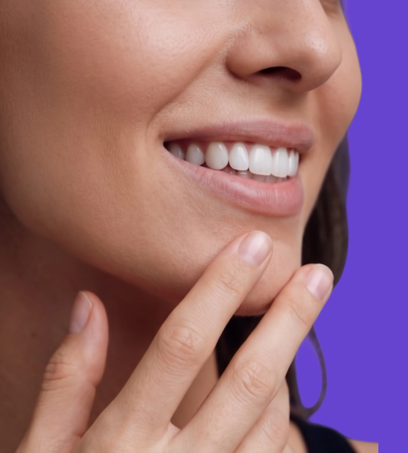 A confident person smiling after whitening with SHIMMER
